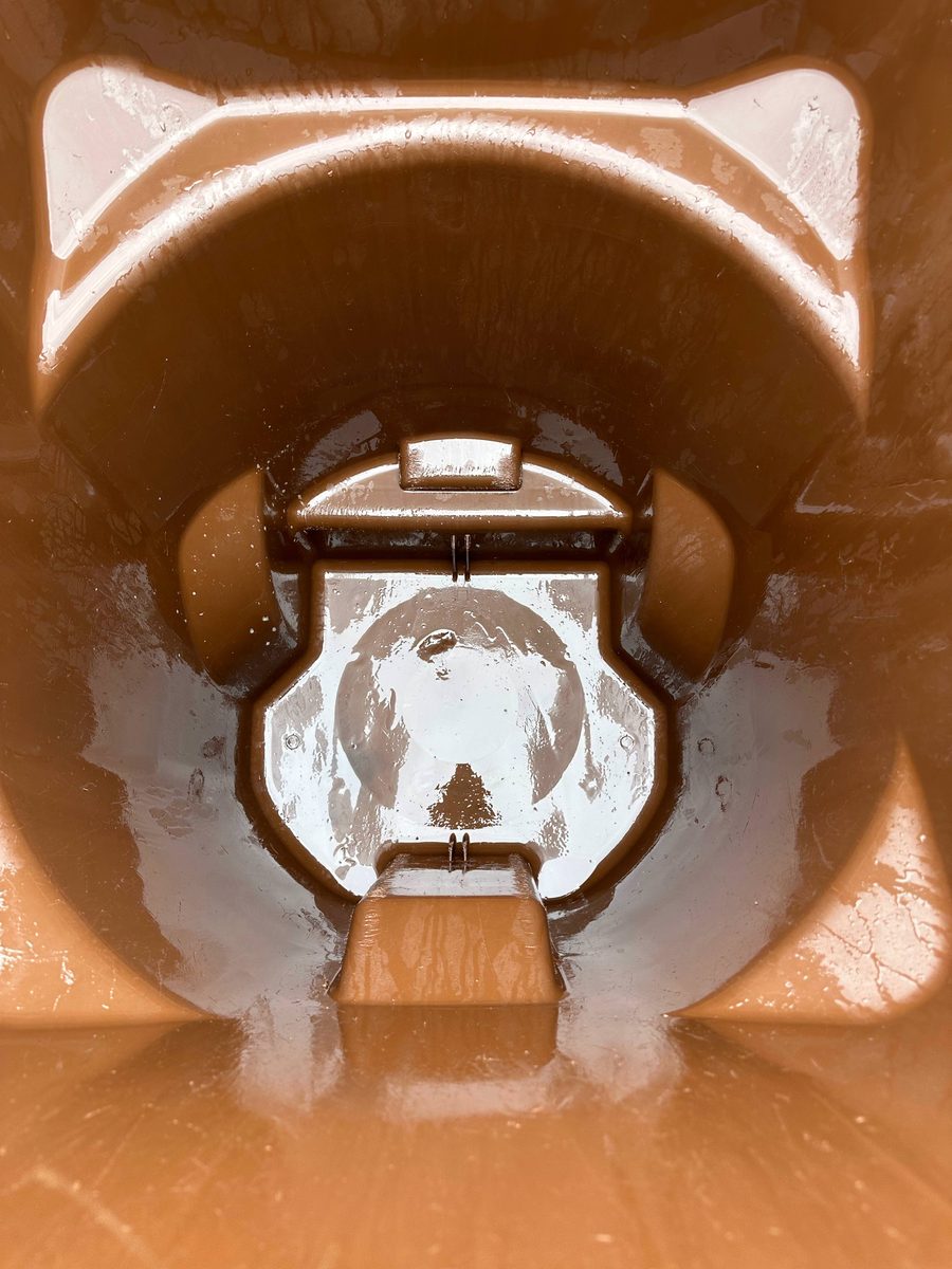 Clean trash bin after professional hot pressure wash