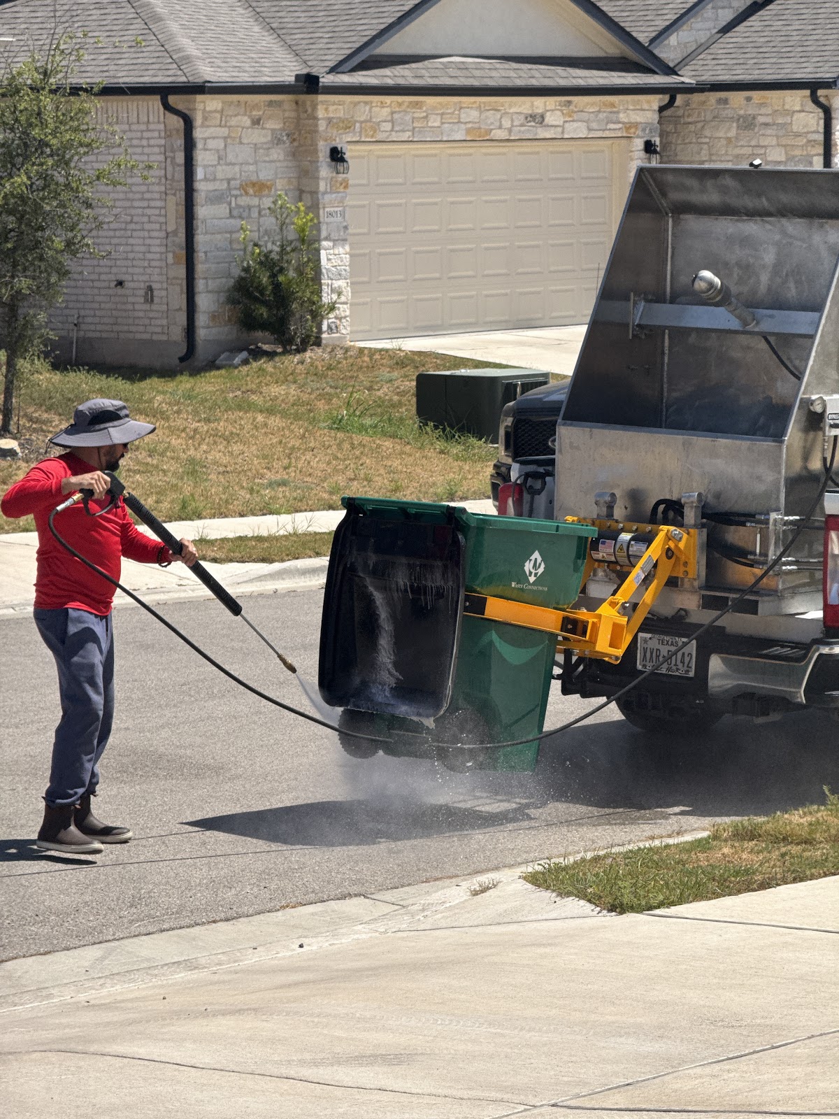 Keep Bin Clean truck and technician pressure washing for Swetha Dhulipala