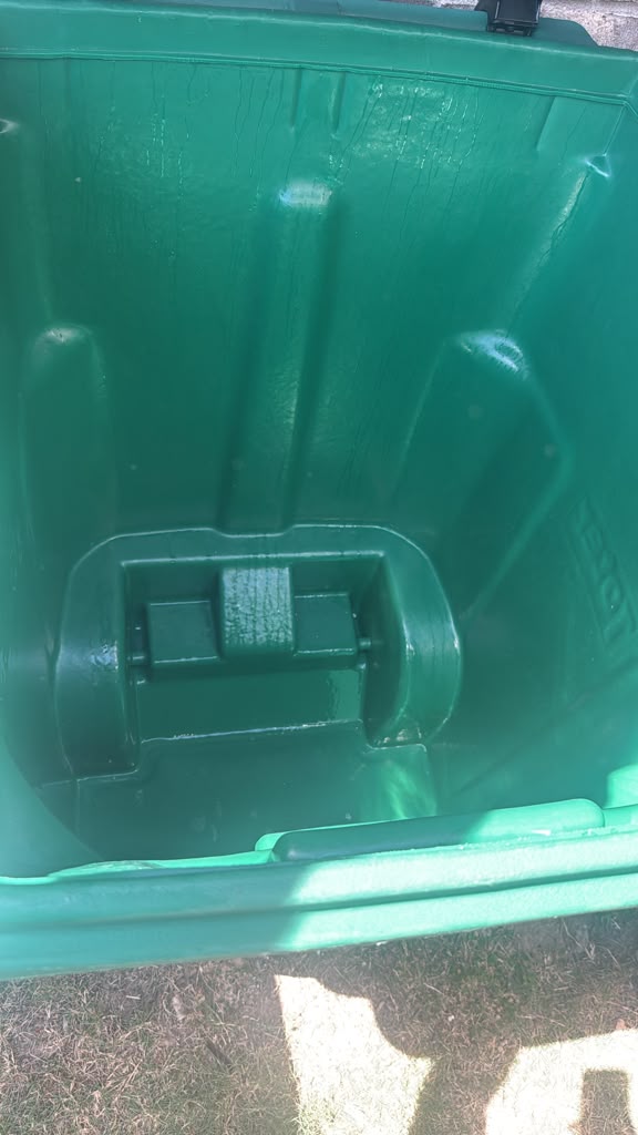Clean green trash bin after Keep Bin Clean service